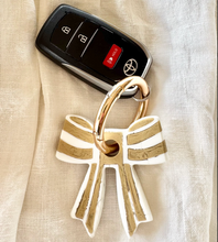 Load image into Gallery viewer, Stripey Bow Resin Keyring | Greenwood Designs