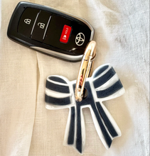 Load image into Gallery viewer, Stripey Bow Resin Keyring | Greenwood Designs