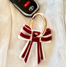 Load image into Gallery viewer, Stripey Bow Resin Keyring | Greenwood Designs