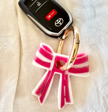 Load image into Gallery viewer, Stripey Bow Resin Keyring | Greenwood Designs